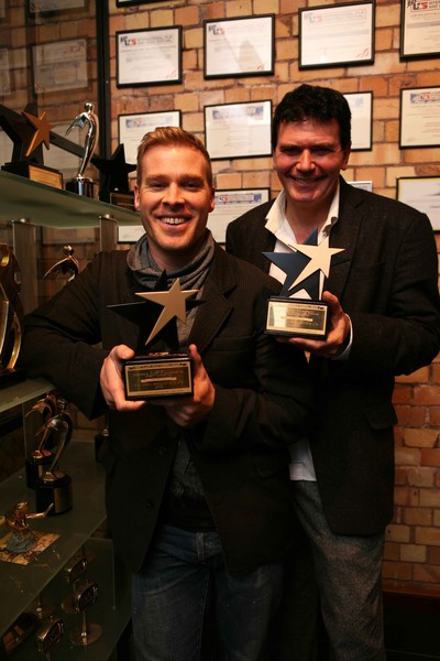 Ondrej Havas (right), and Andrew Eggleton with the US awards at Omnicron�s Auckland studio.
